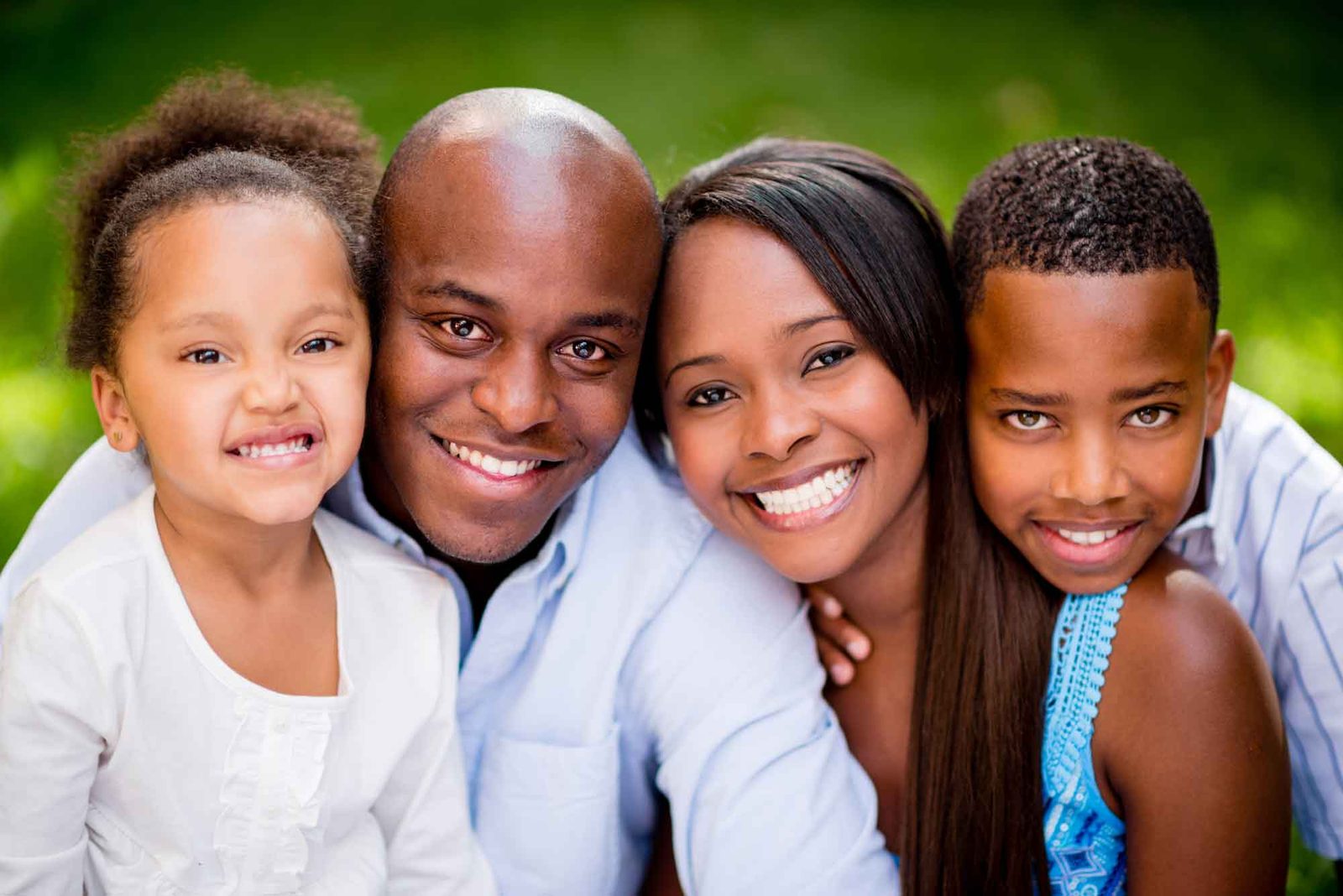 A smiling family of four